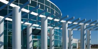 A large building with a lot of columns in front of it.