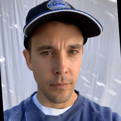 customer giving a testimonial for an ai biotech company [headshot]