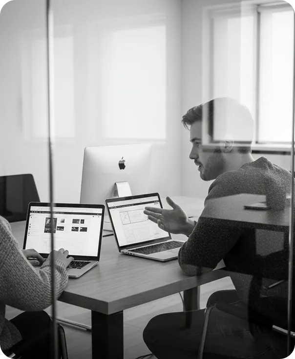 Two professionals discussing business needs