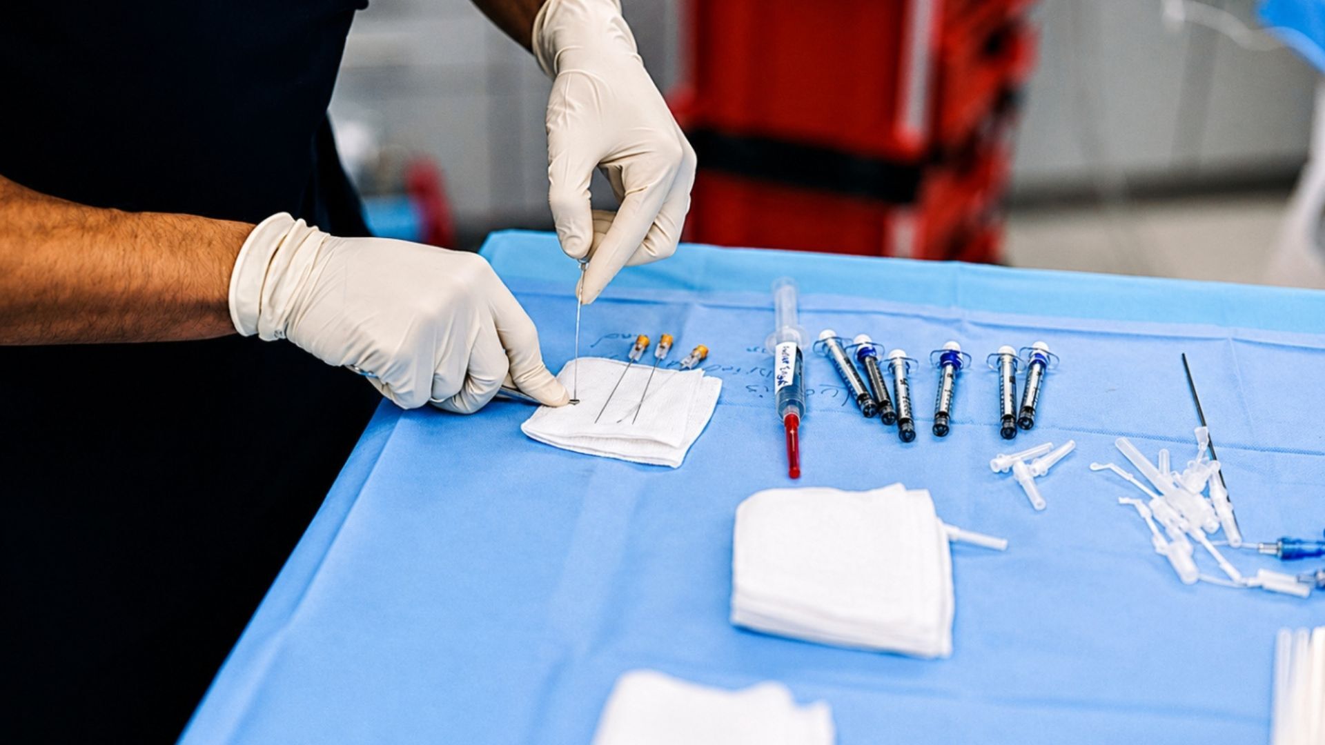 Medical provider preparing injection supplies for regenerative pain treatment