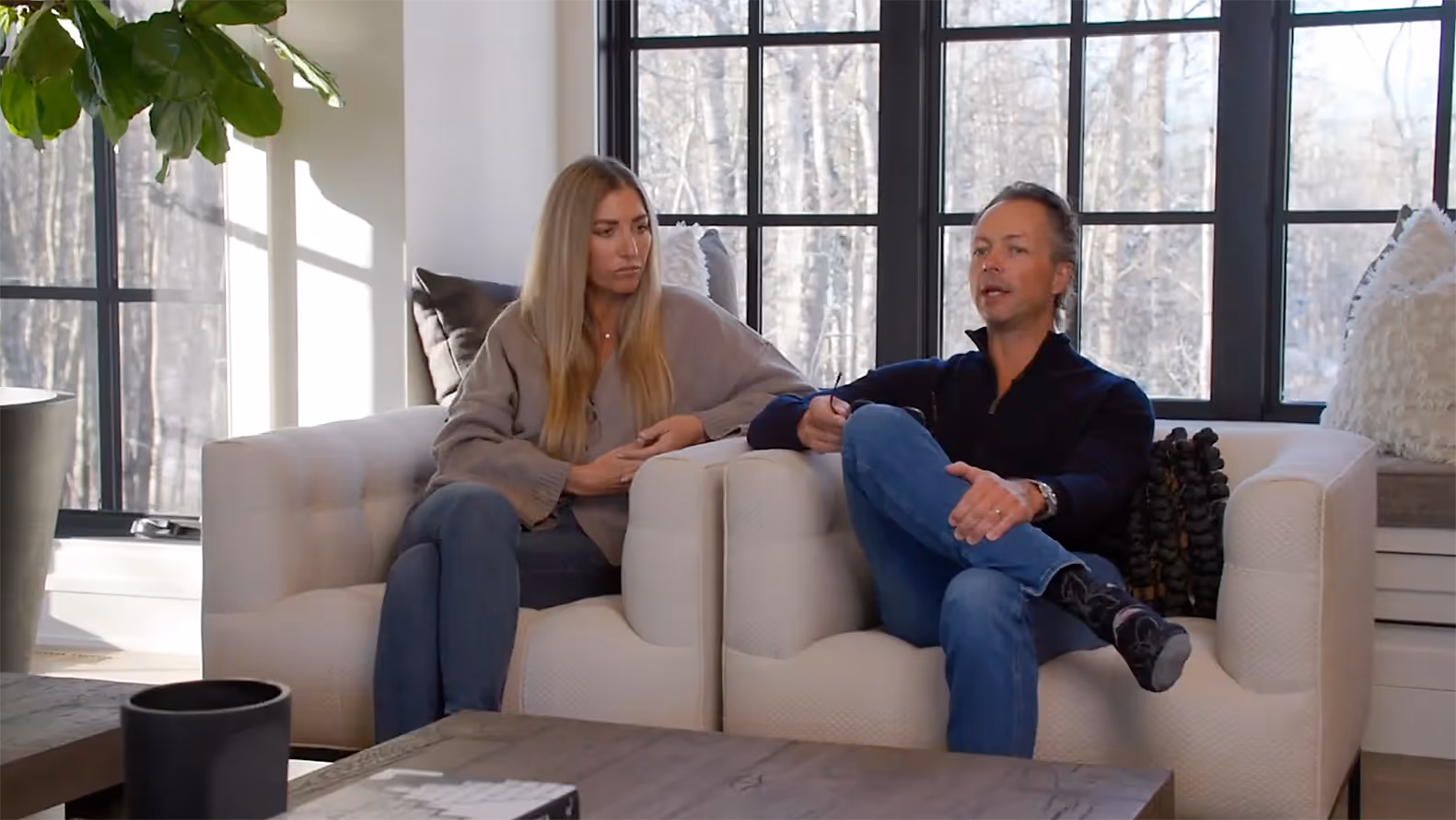 Veranda owners sitting on a couch