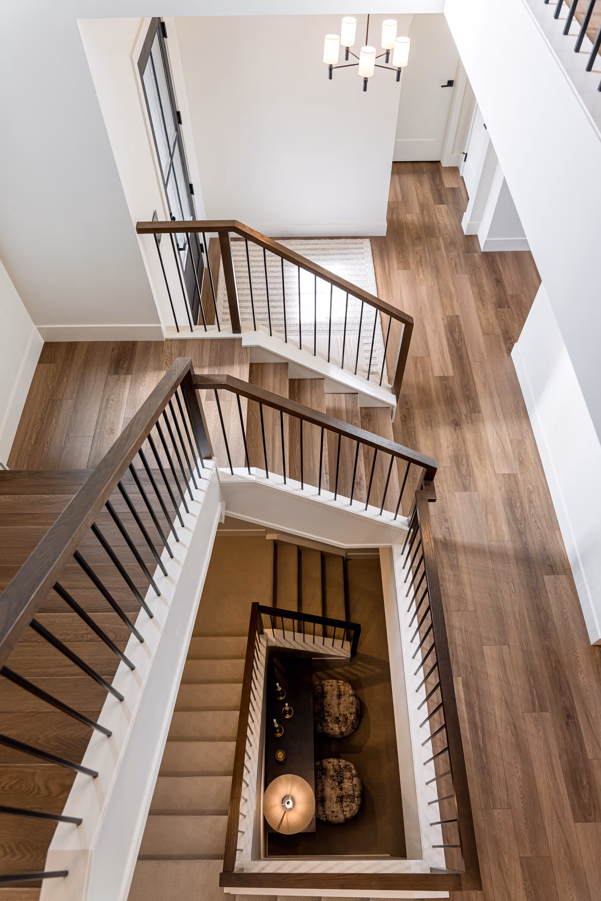 A staircase leading to a second floor bedroom.