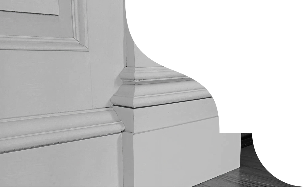 Detail image of some architraves and skirting boards.