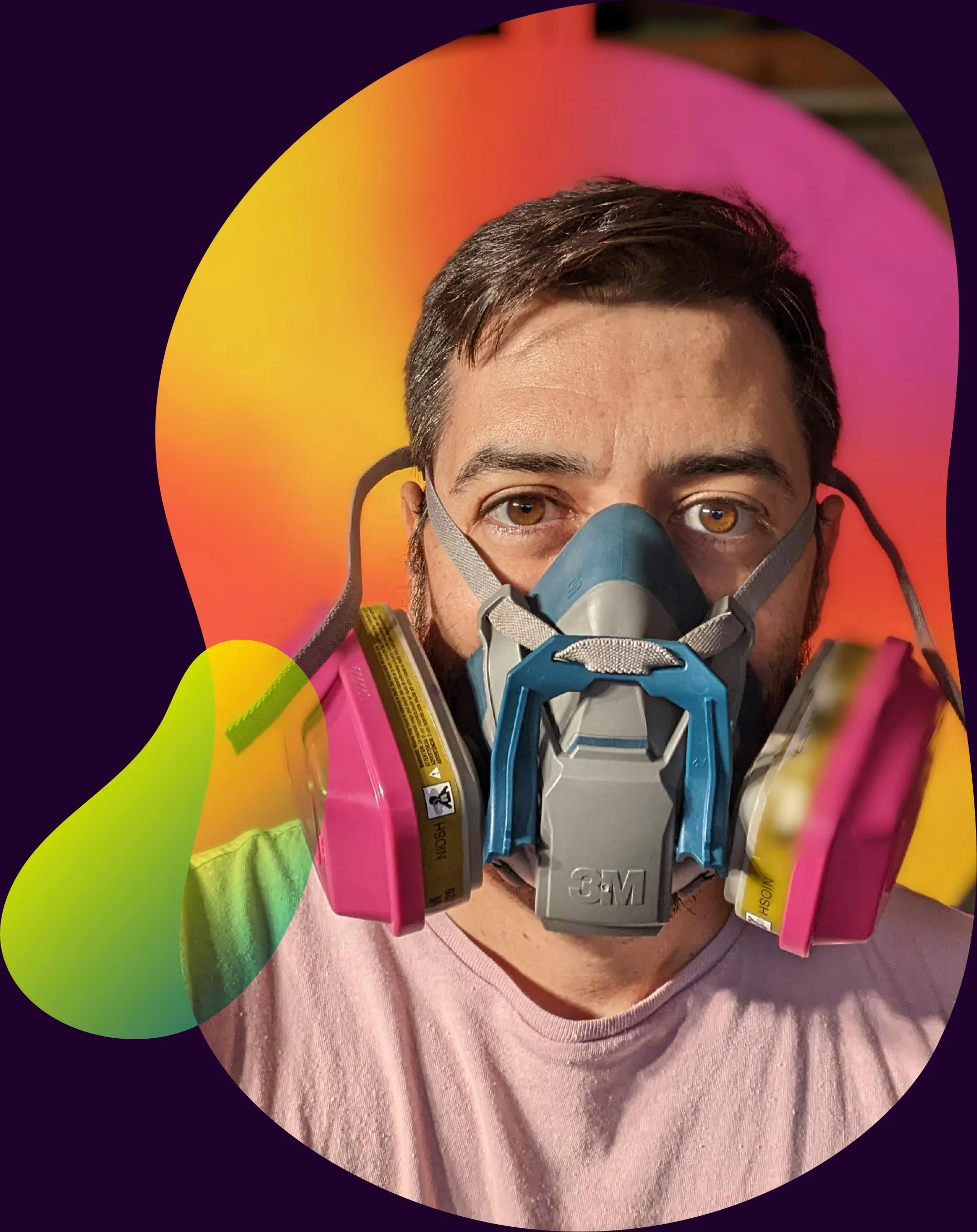 Adam Raiola wearing a spray paint respirator mask