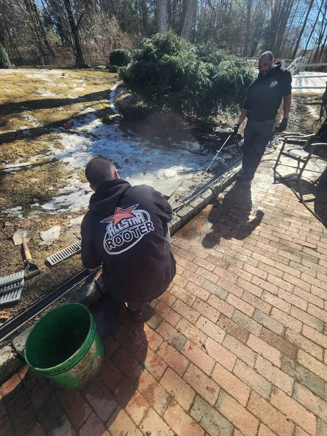 Outdoor trenching and pipe setup for French drain installation in Norwalk CT
