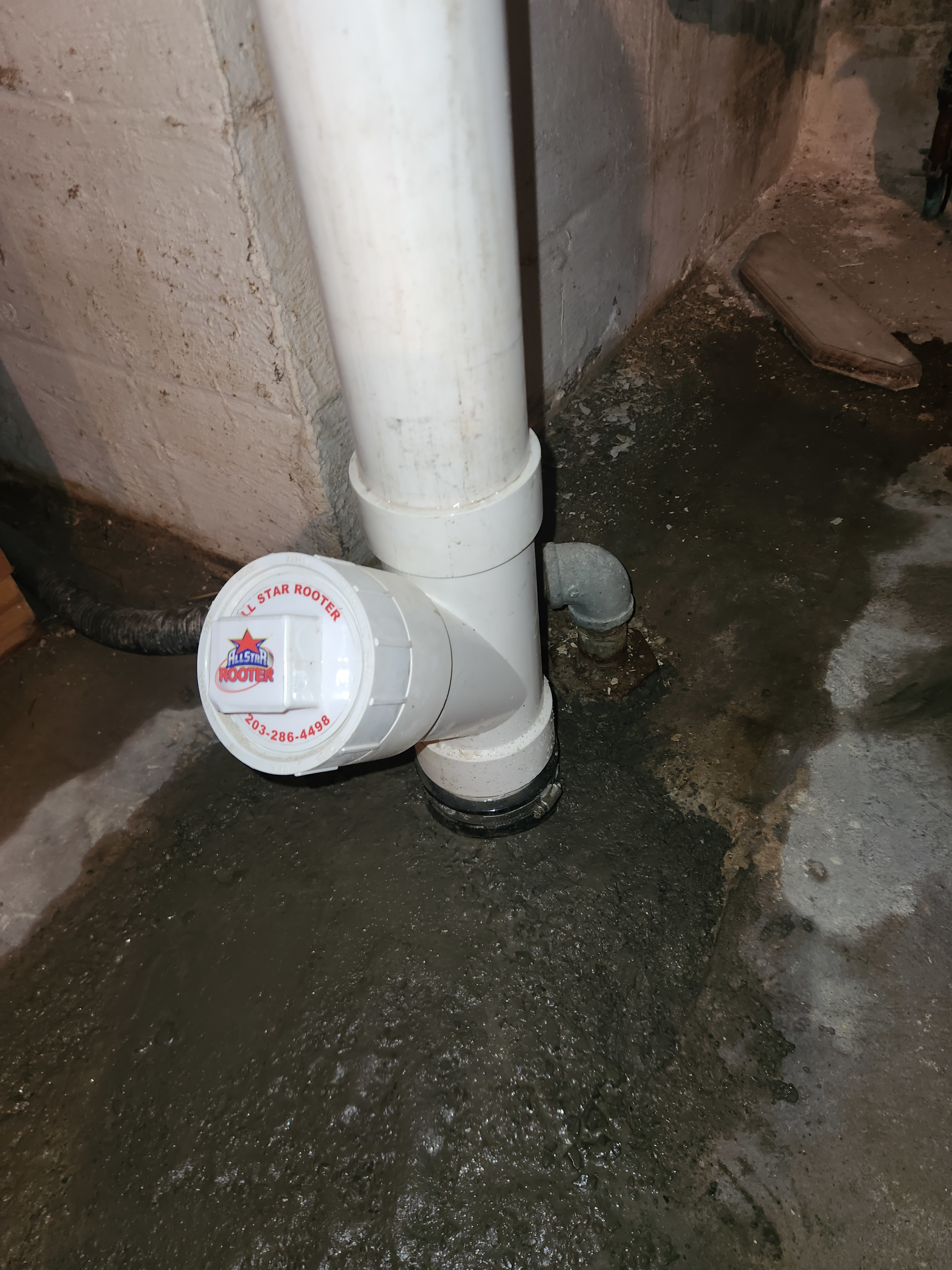 New PVC leader drain line installation in basement to improve water drainage in Norwalk CT