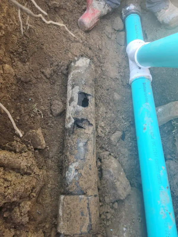 Corroded cast iron pipe showing damage before pipe descaling service