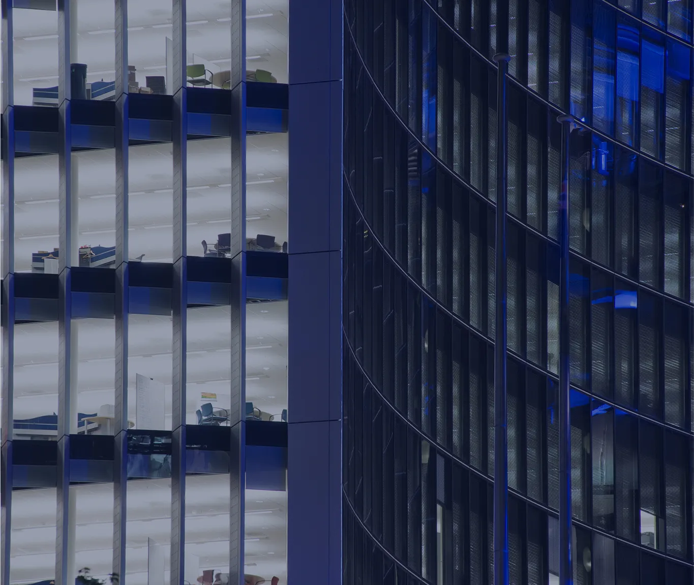 Modern glass skyscraper symbolizing investment infrastructure