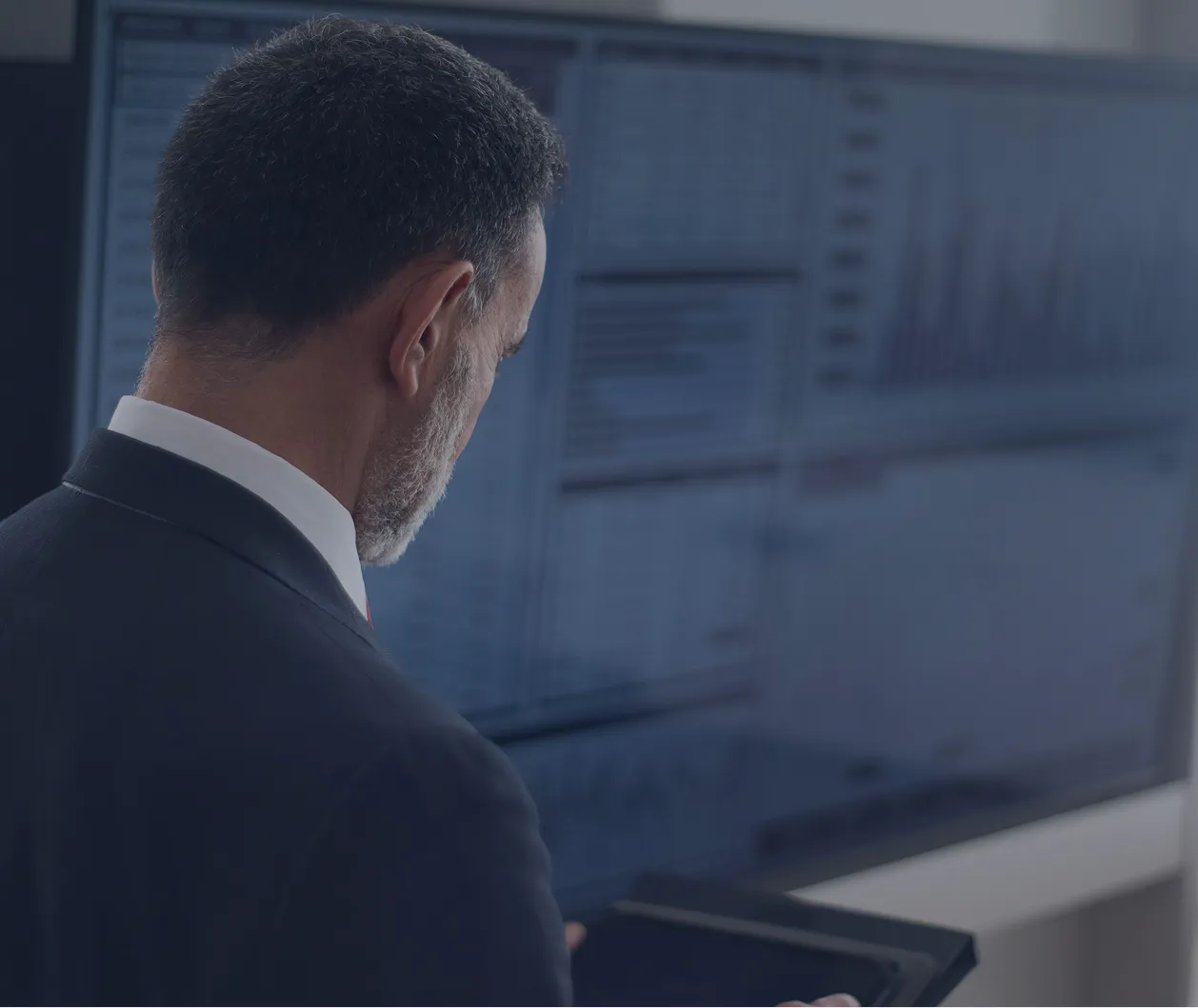 Businessman reviewing reports symbolizing independent financial advice