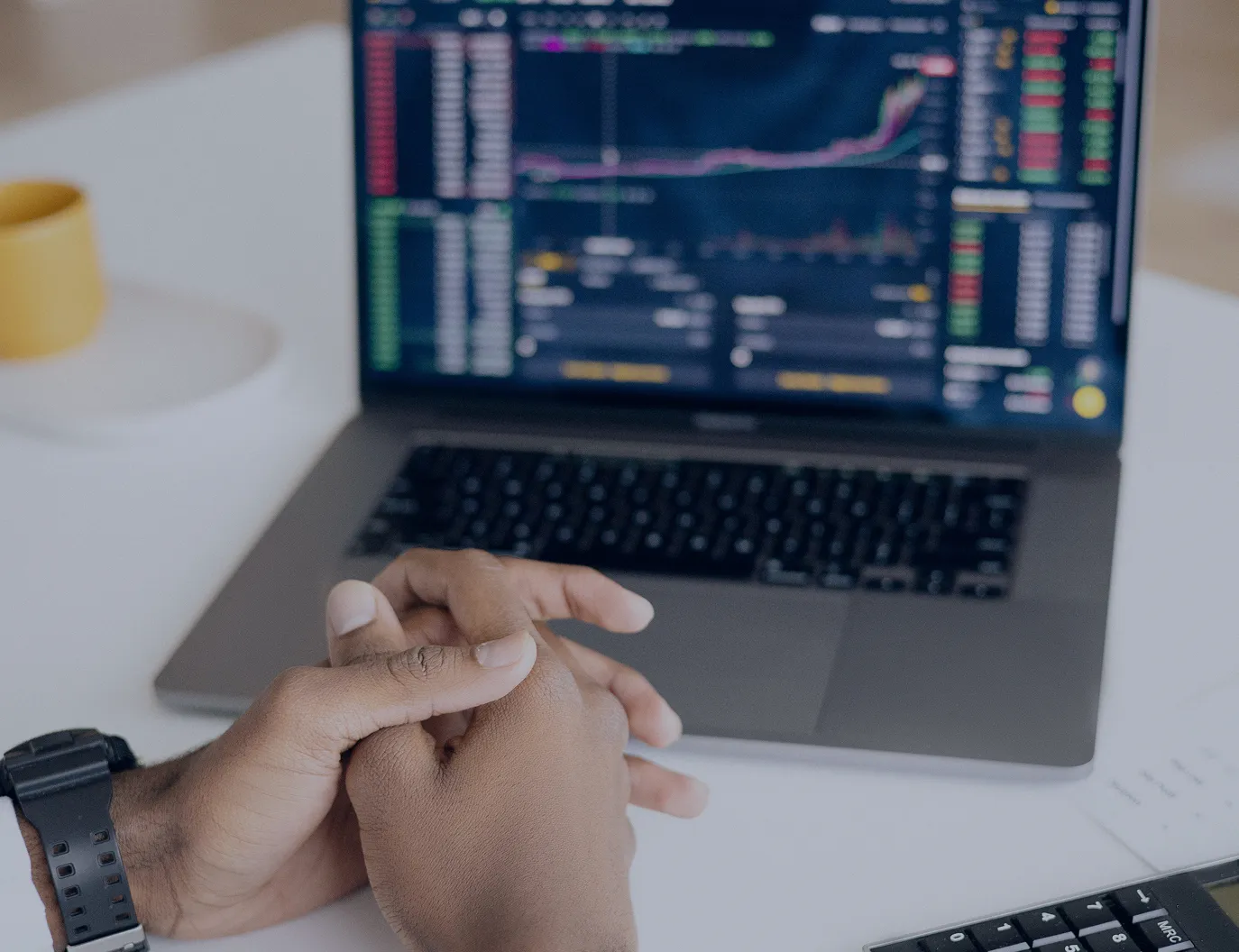 Professional analyzing performance data on a digital screen