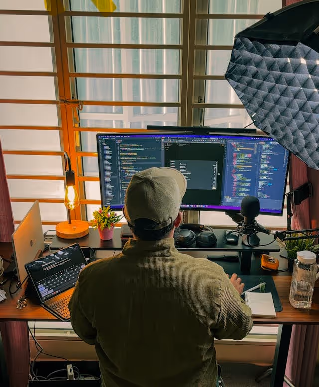big monitor screen with coding