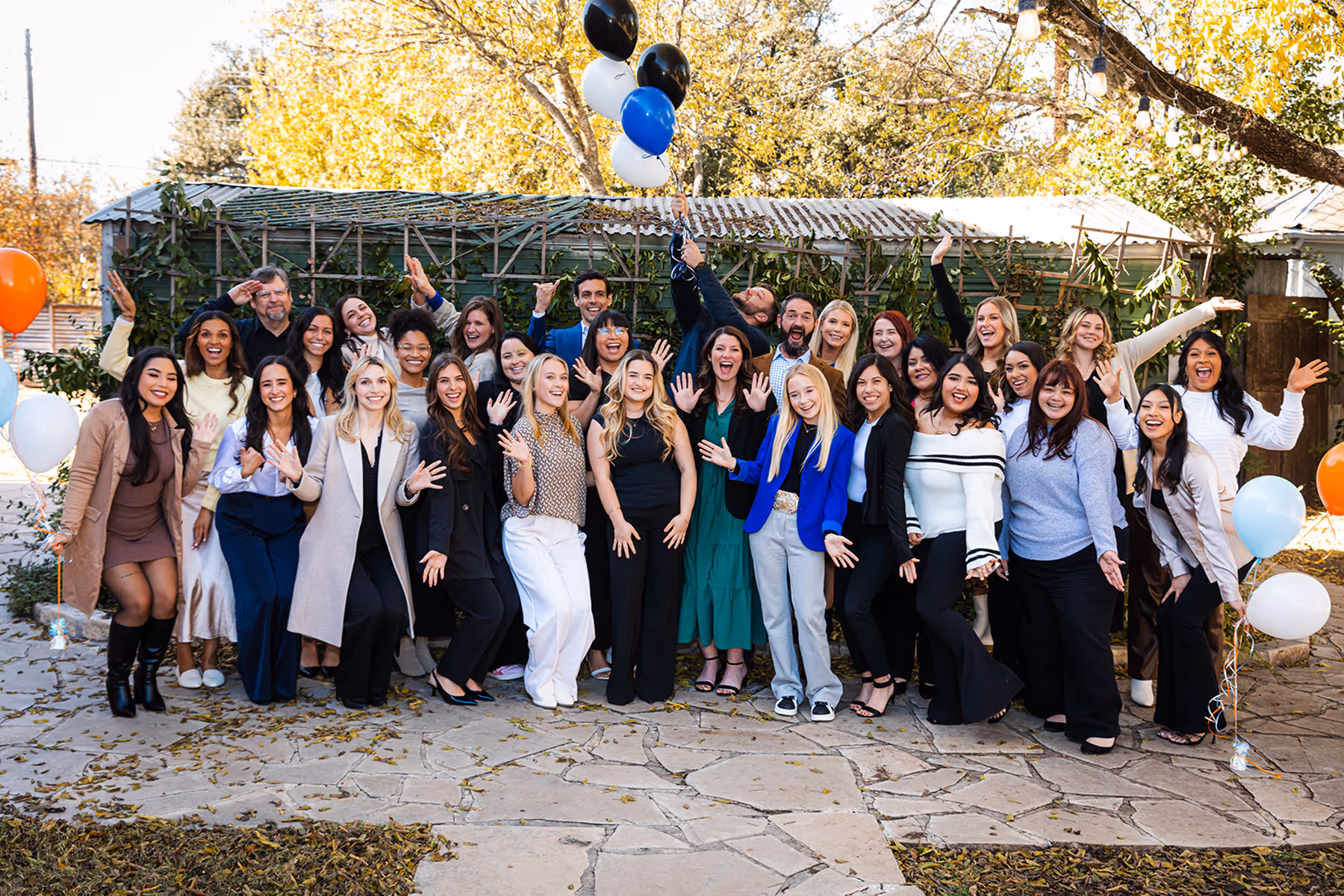 A group of people standing next to each other.