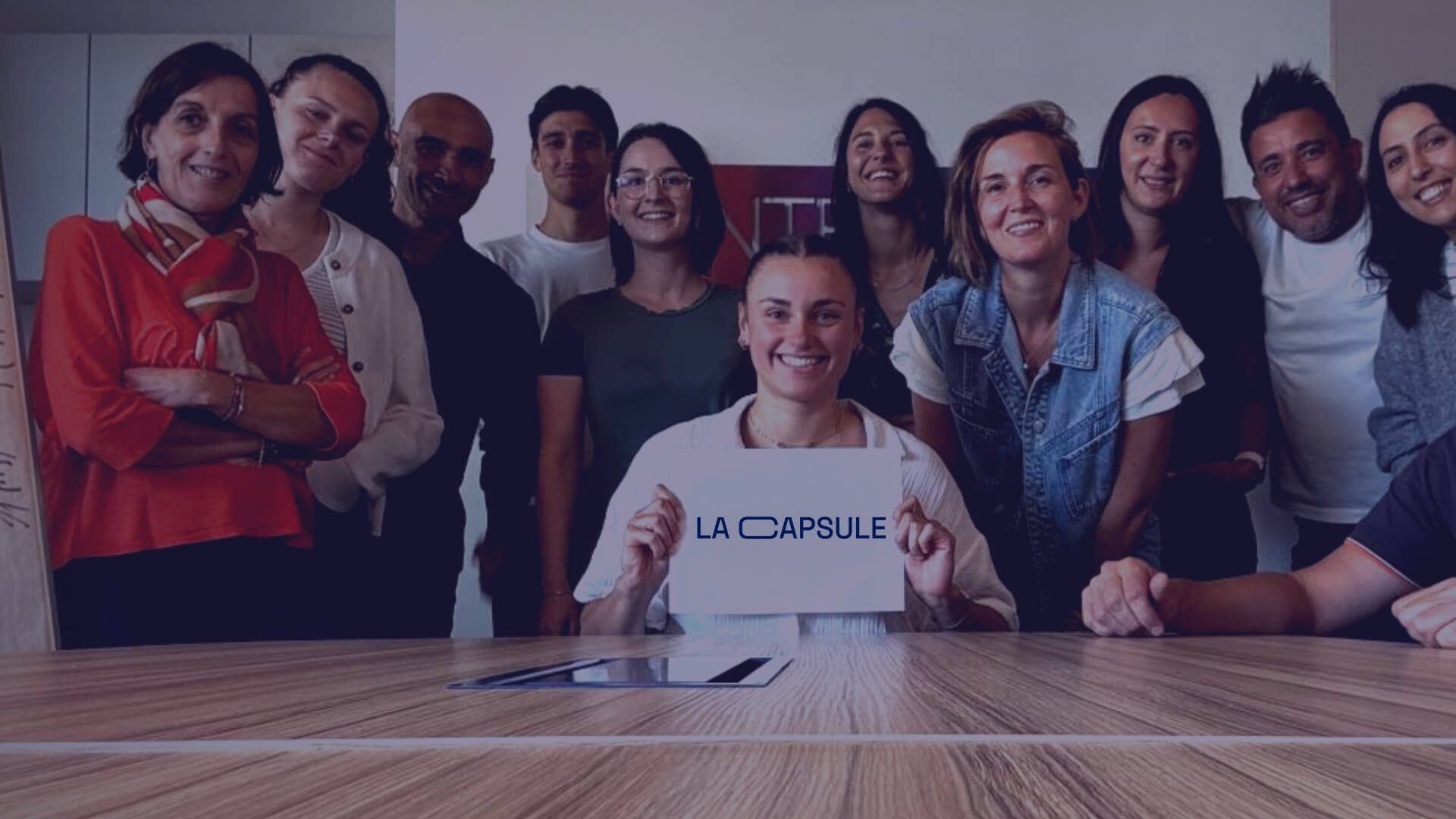 [background image] image of office workspace with desks (for a film production company).