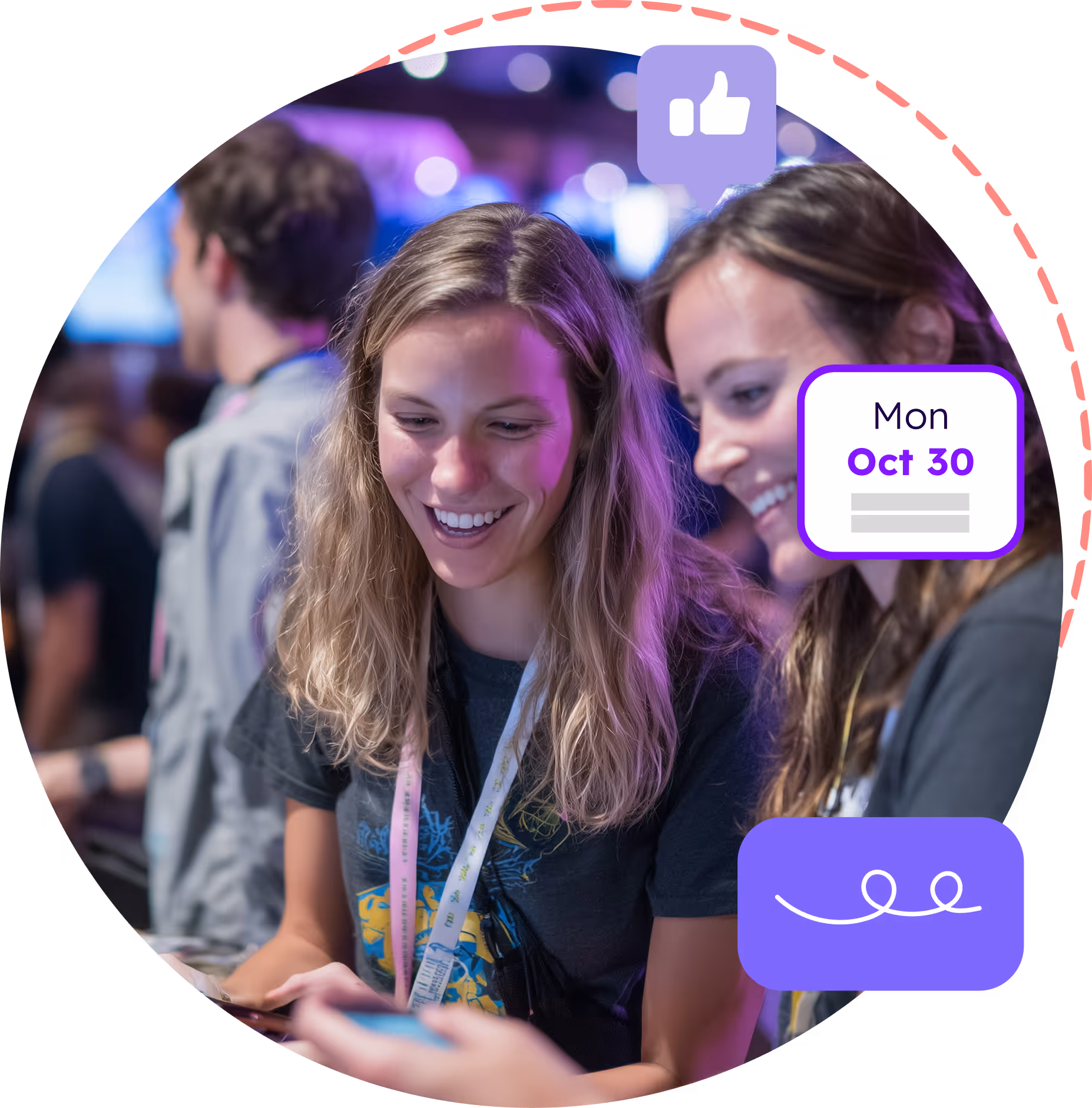 Two women smiling and looking at a smartphone together at a social event with blurred people in the background.