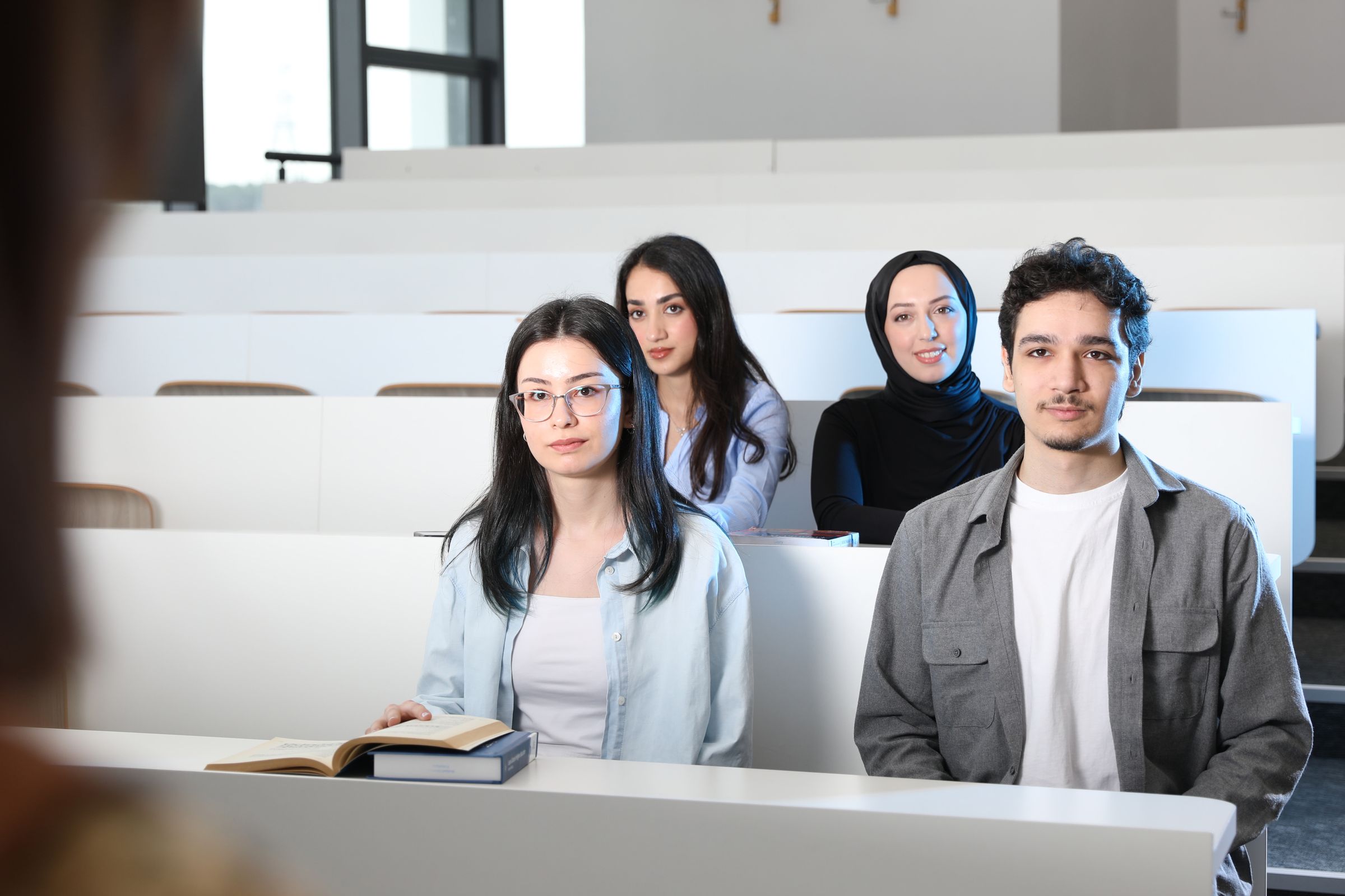 Students seated in a lecture hall during a campus session
