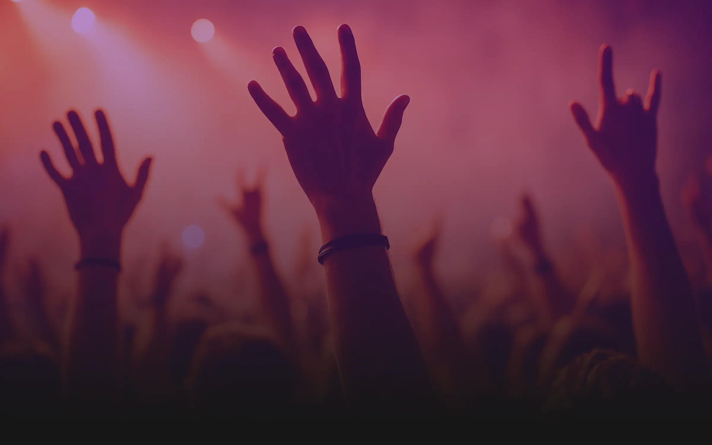 Hands in the air at a music concert