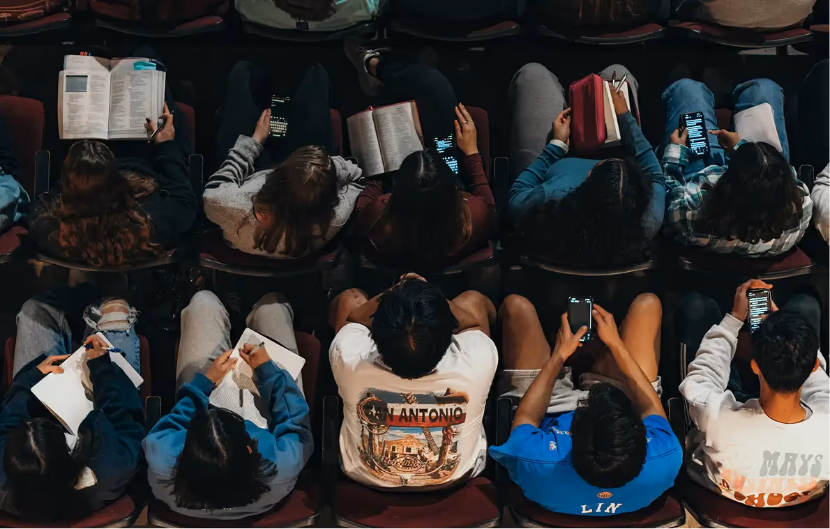 A men in a blue shirt.