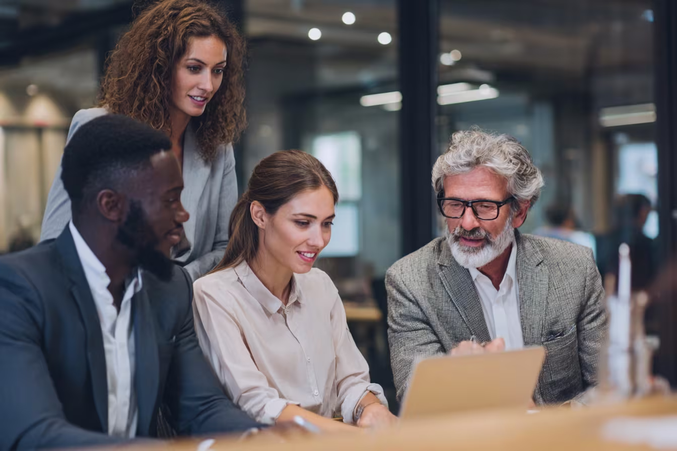 Diverse professionals discussing IT procurement strategy