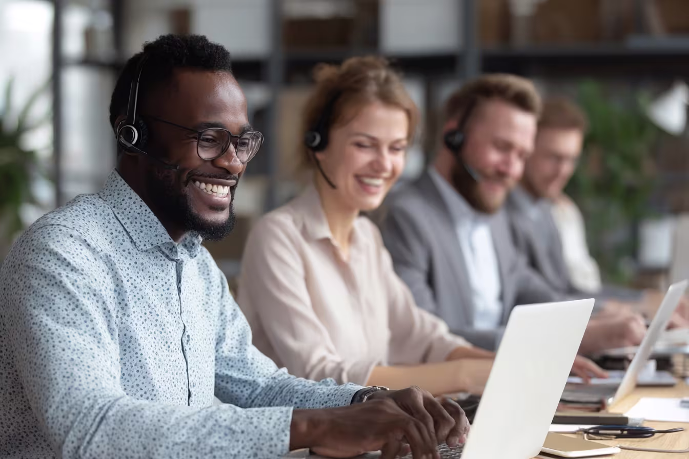 Diverse professionals using managed IT services