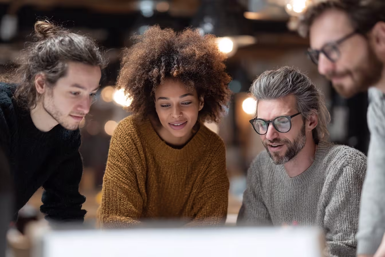 Diverse SOC management team strategizing