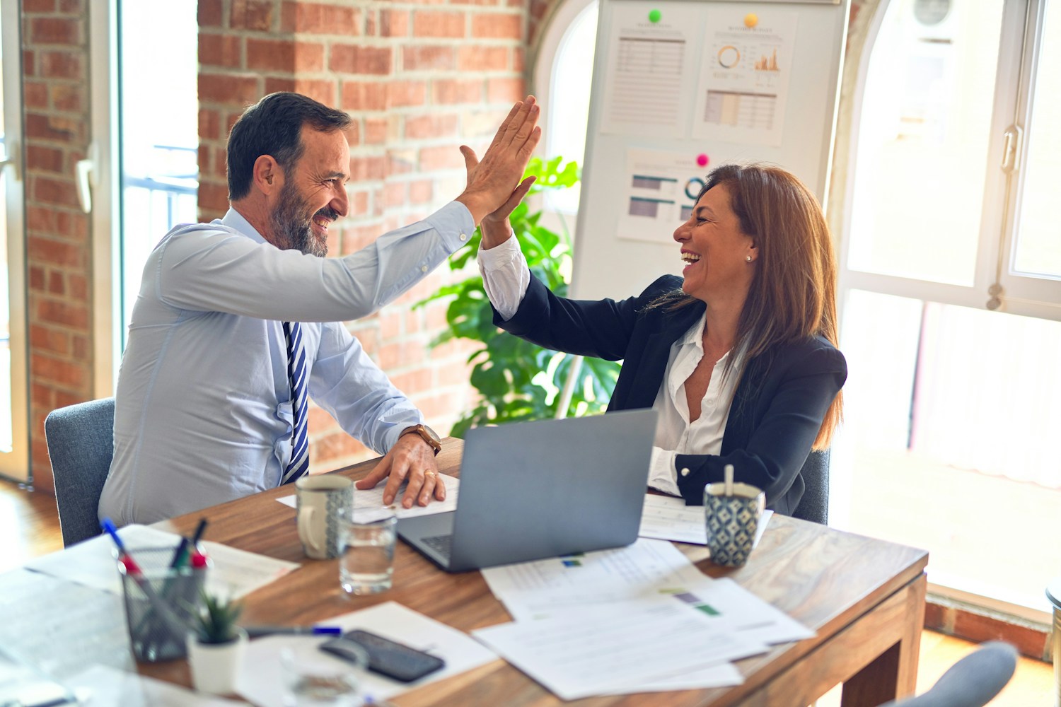 IT professional presenting a compliance report to a client