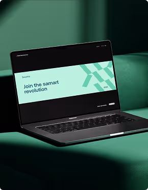 Open laptop showing a website banner reading 'Join the samart revolution' on a green background.