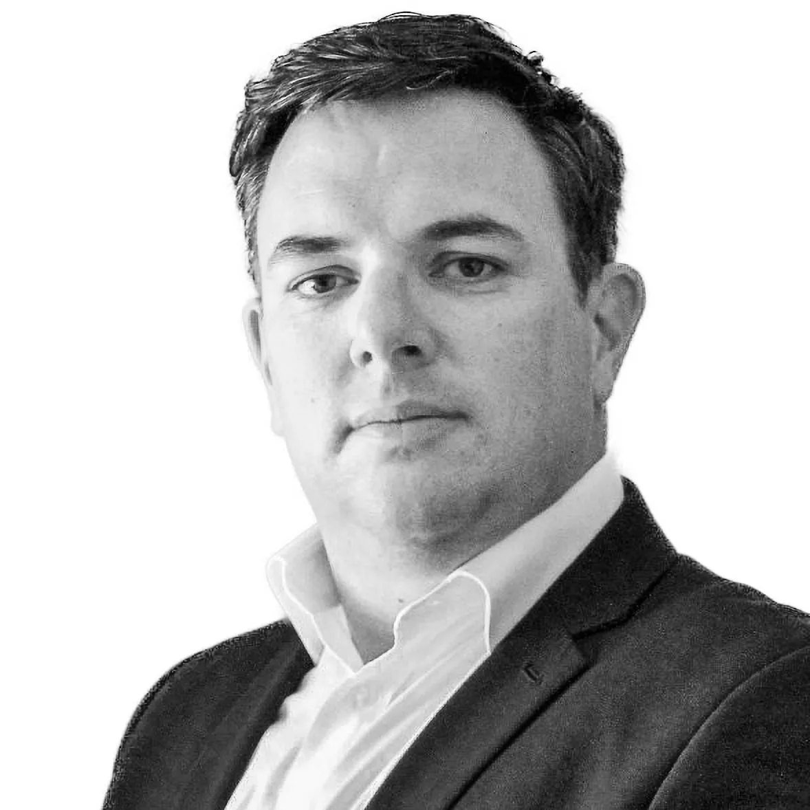 Professional male team member at Revenue Nomad, contributing to sales enablement and RevOps solutions for fast-growing B2B organizations.