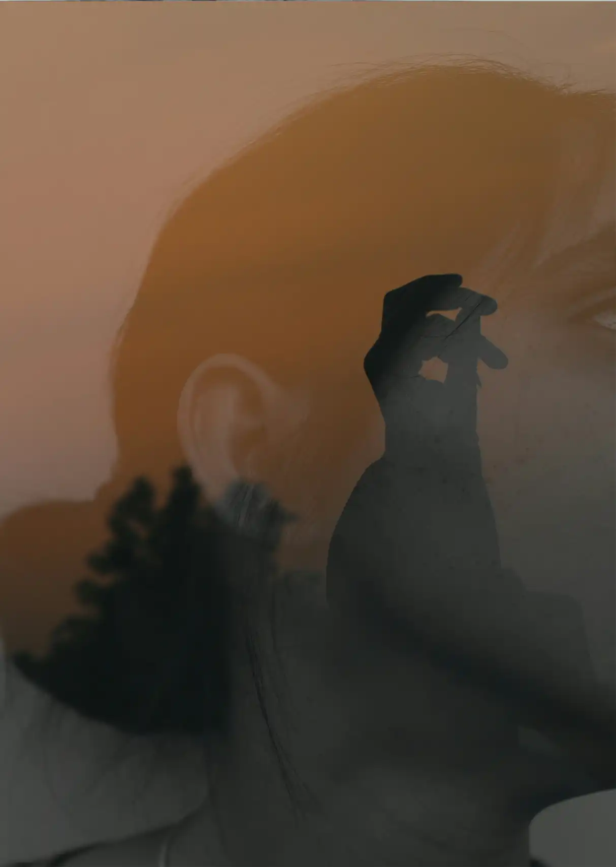 A close up photo of a woman looking to her left, with the reflection in the window of a person's hand and tree adding a mysticism to the image