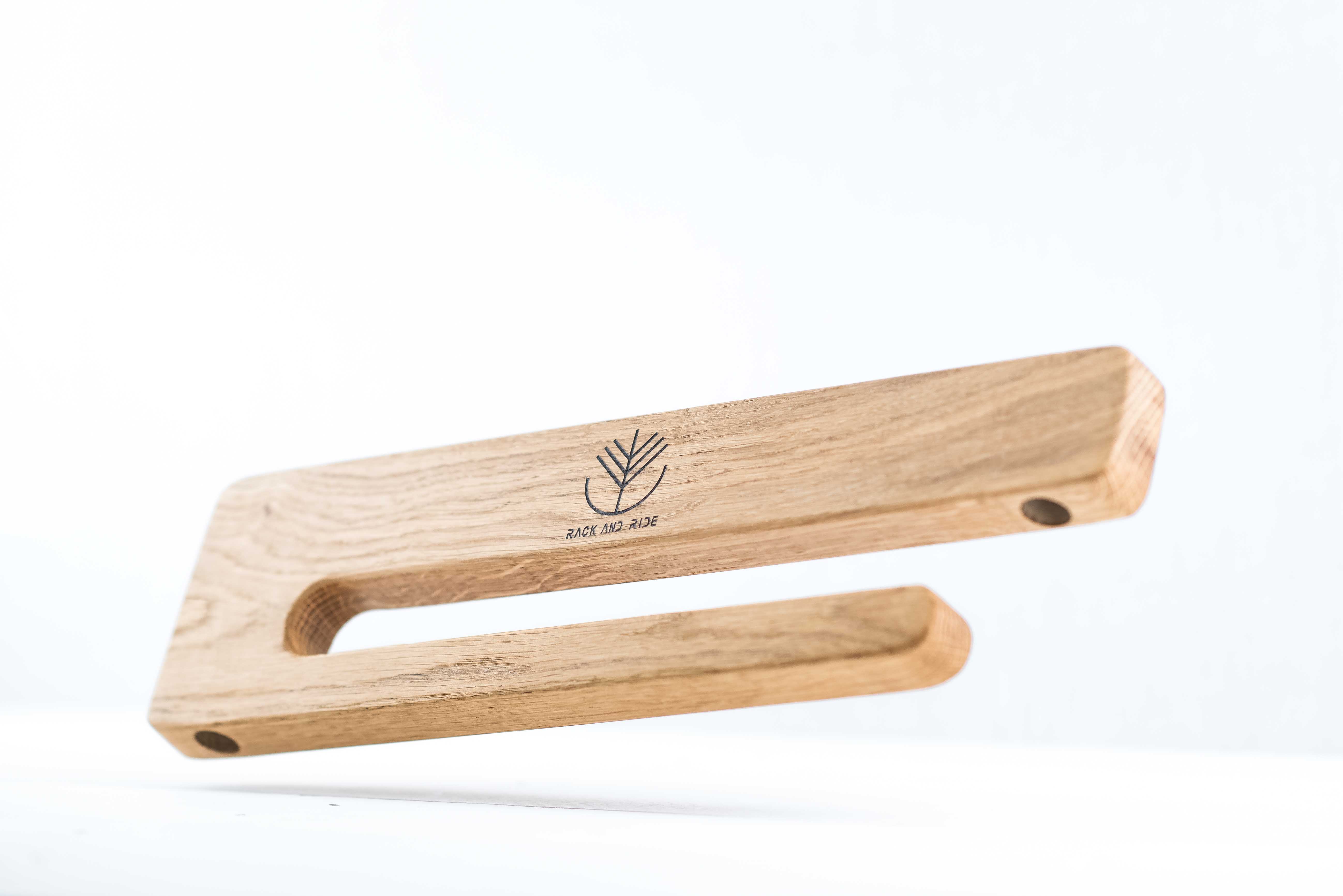 Wooden wall mount for skateboard