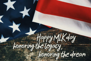 MLK Day flag image with the words "Happy MLK Day, Honoring the Legacy, Honoring the dream"