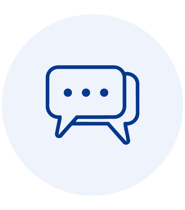 Blue chat bubbles icon with three dots inside on a light circular background.