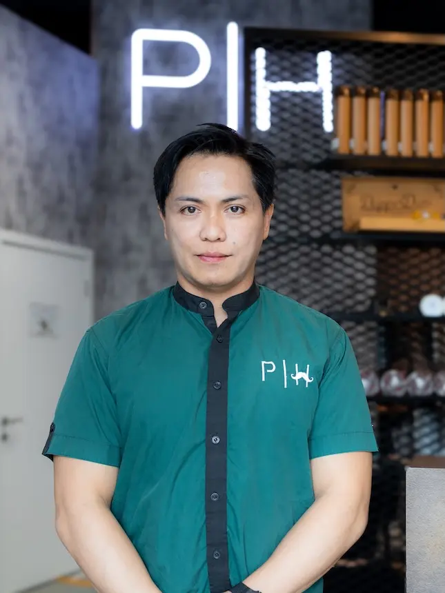 Emmanuel professional technician providing premium services at Project Hairway barbershop