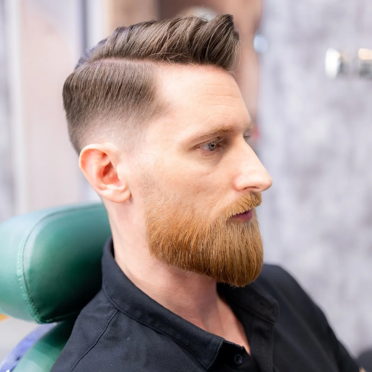 Barber giving precision beard trim at Project Hairway Dubai