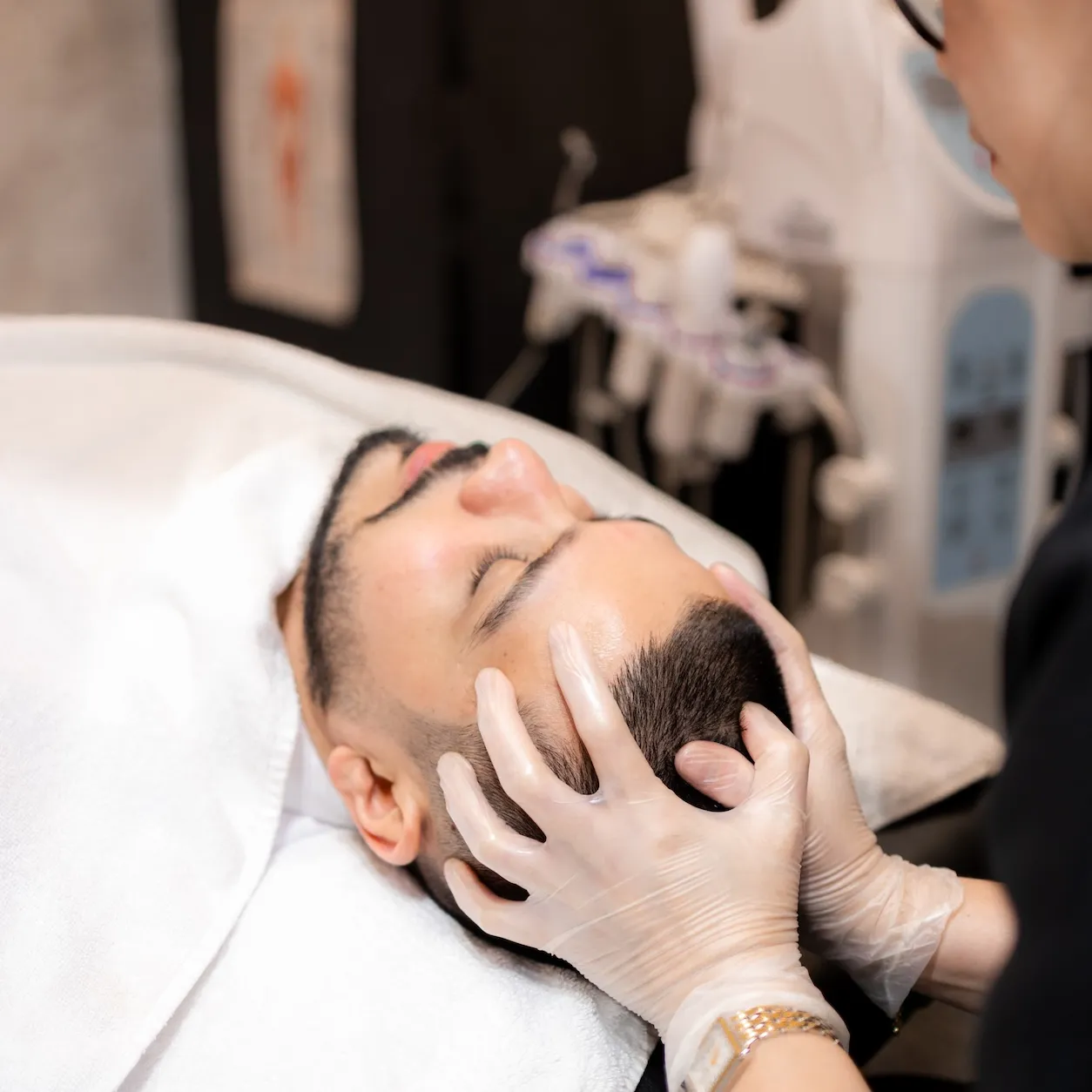 Premium men's facial treatment with relaxing head massage at Project Hairway luxury spa Dubai