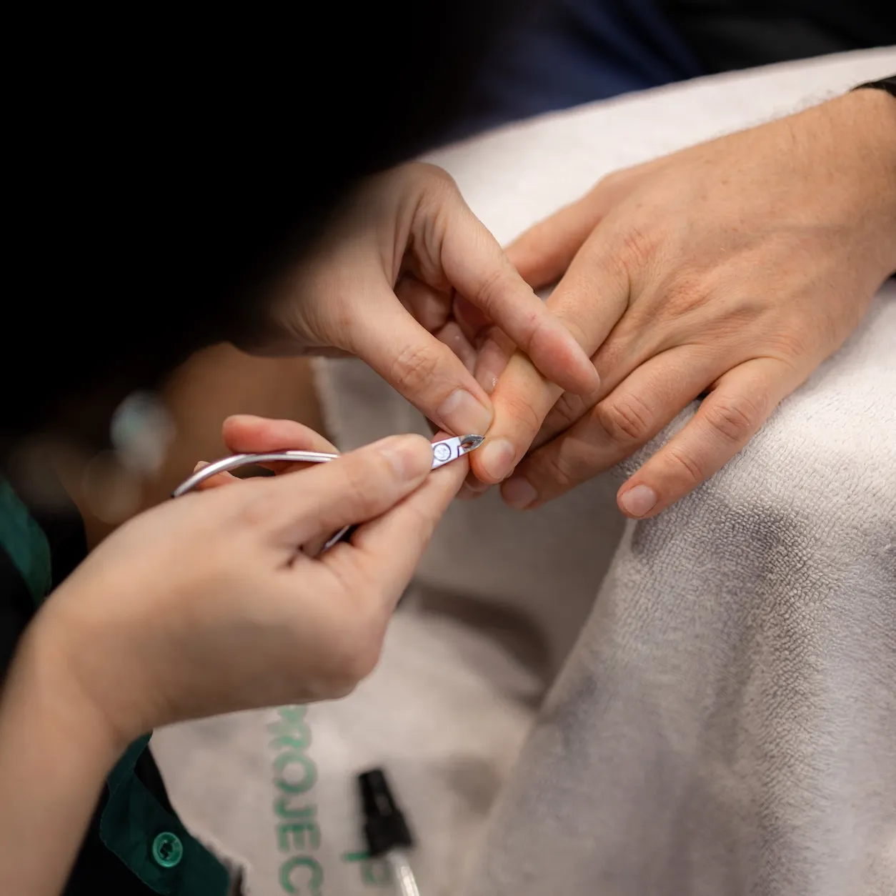 Professional men's manicure service with precision cuticle trimming at Project Hairway Dubai salon