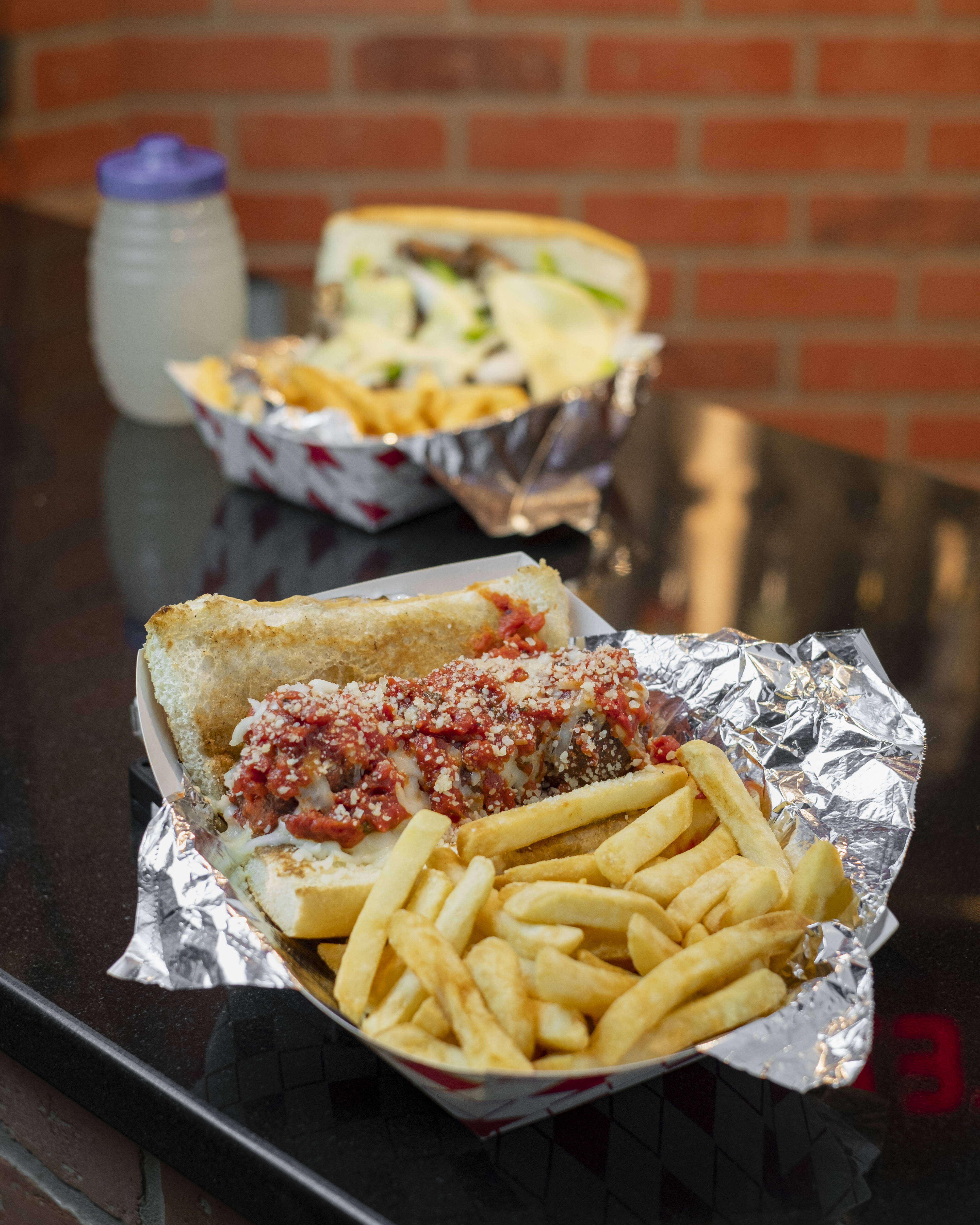 Sandwich and slice of lemons