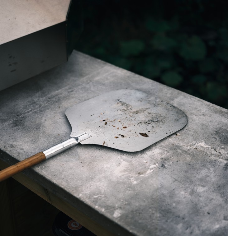 Young diverse couple having lunch with junk food