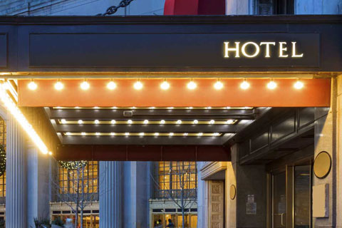 side view from an hotel entrance, with lights and a broadwaystyle decoration