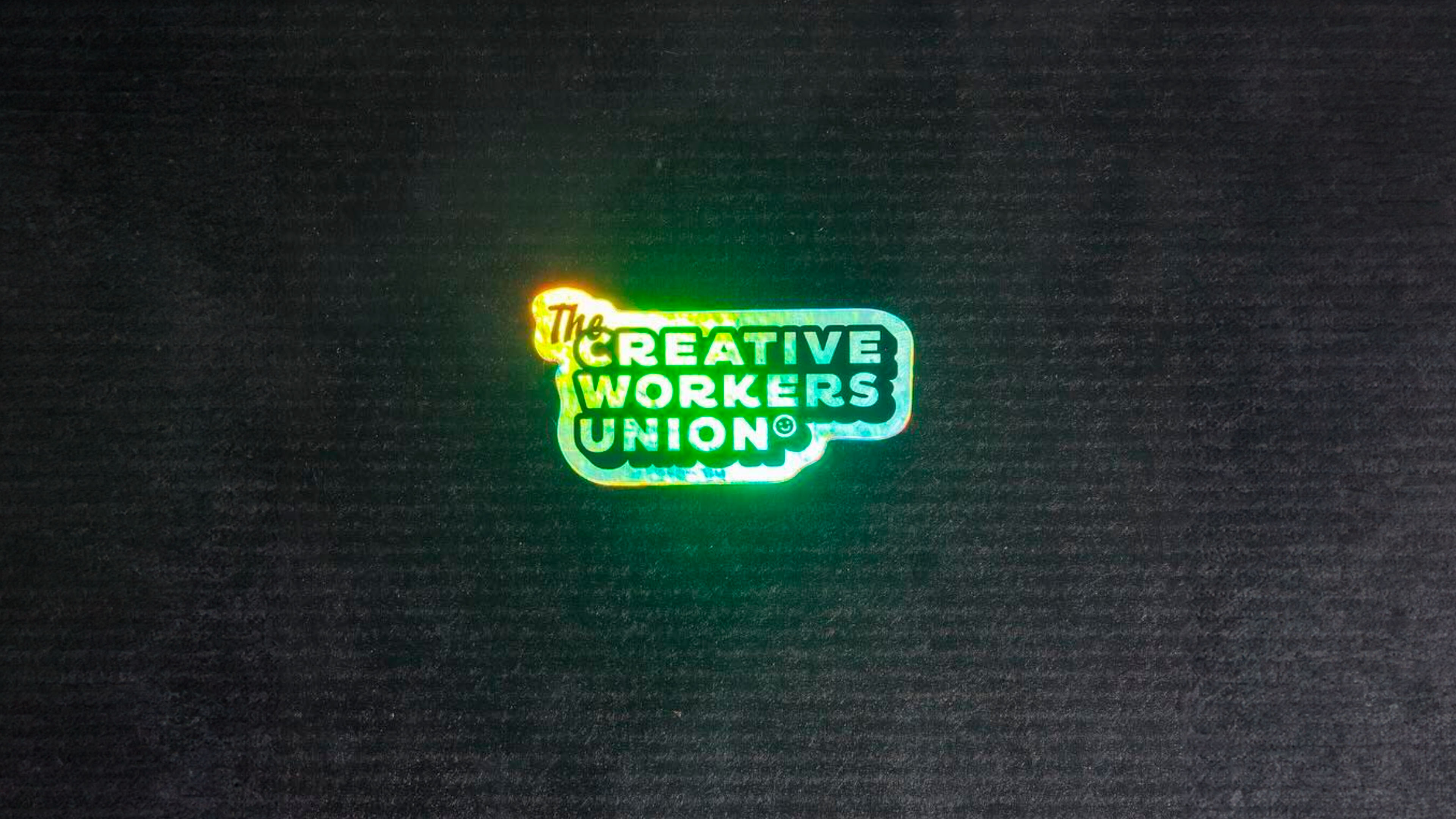 Brand identity, print collateral, and marketing materials designed for The Creative Workers Union.