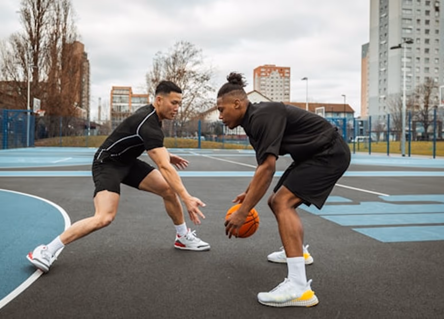 Athletes playing basketball
