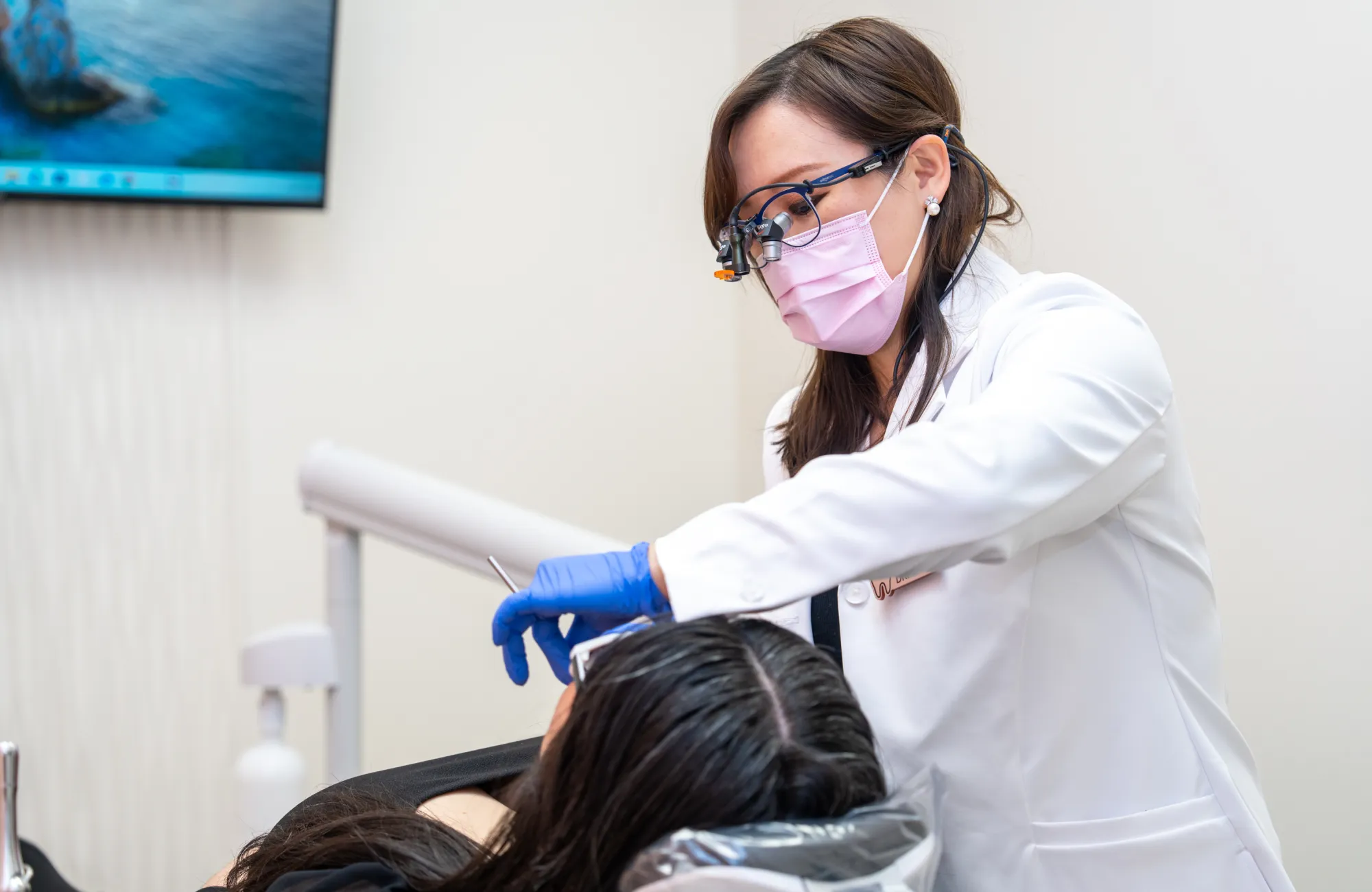 Dr. Shen checking patient