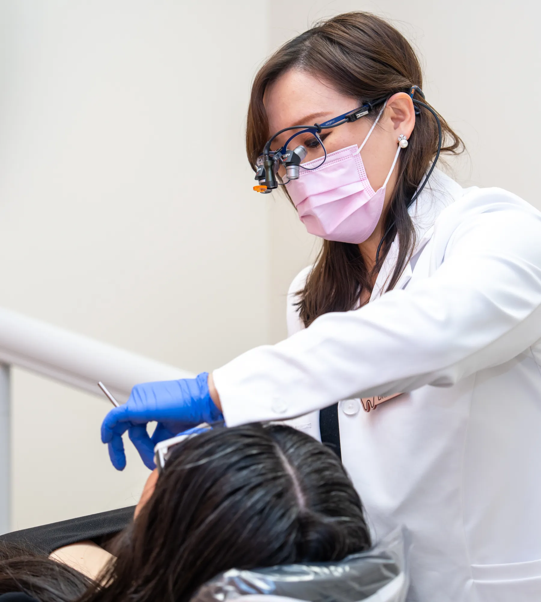 Dr. Shen checking patient