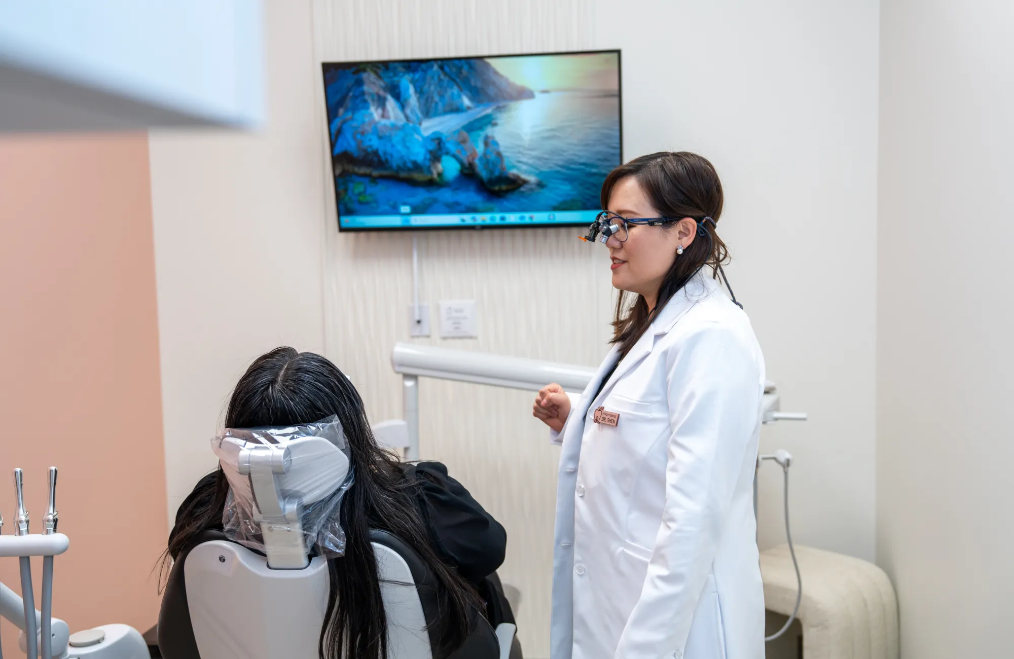 Dr. Shen talking to patient