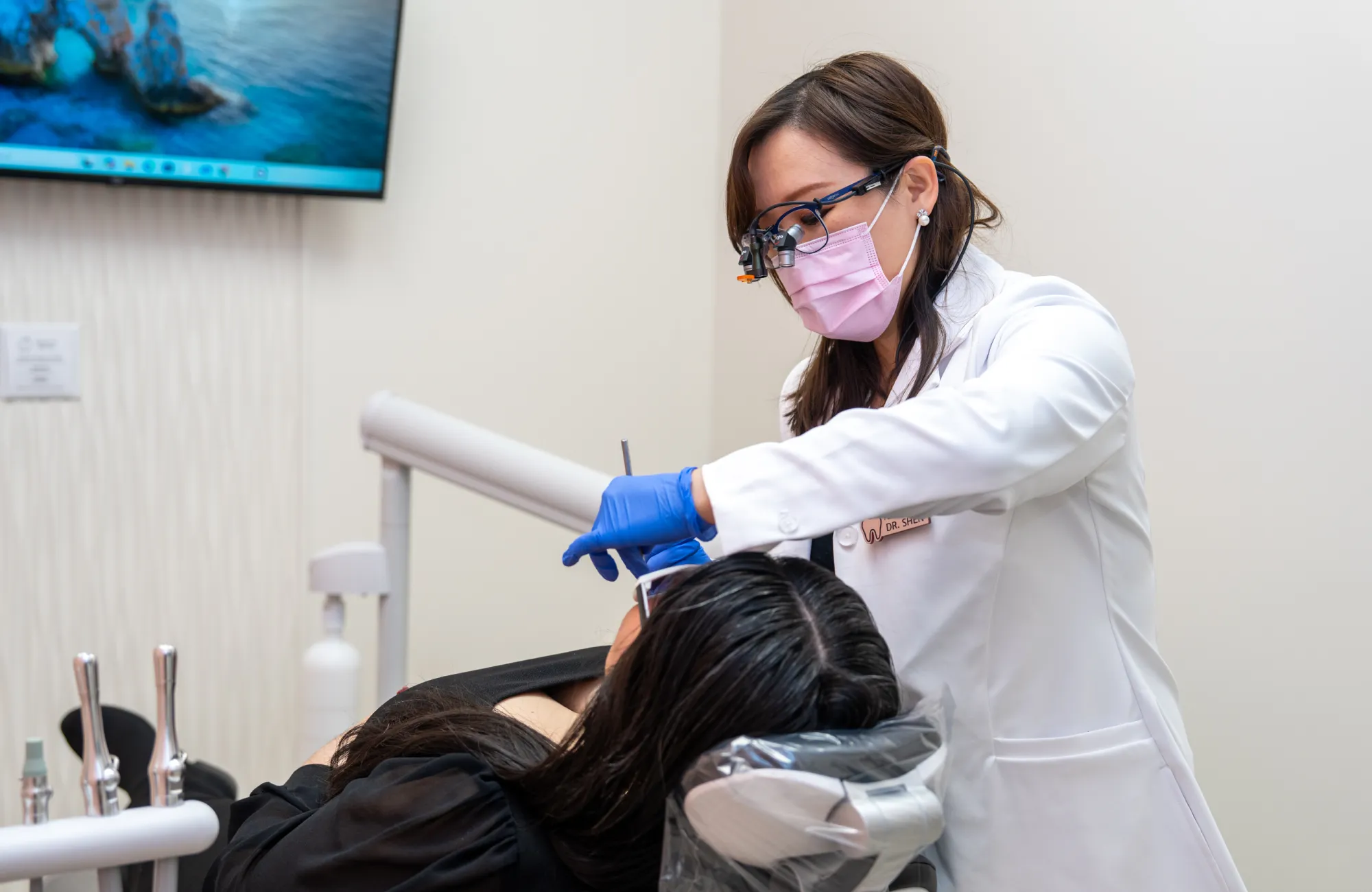 Dr. Shen checking patient