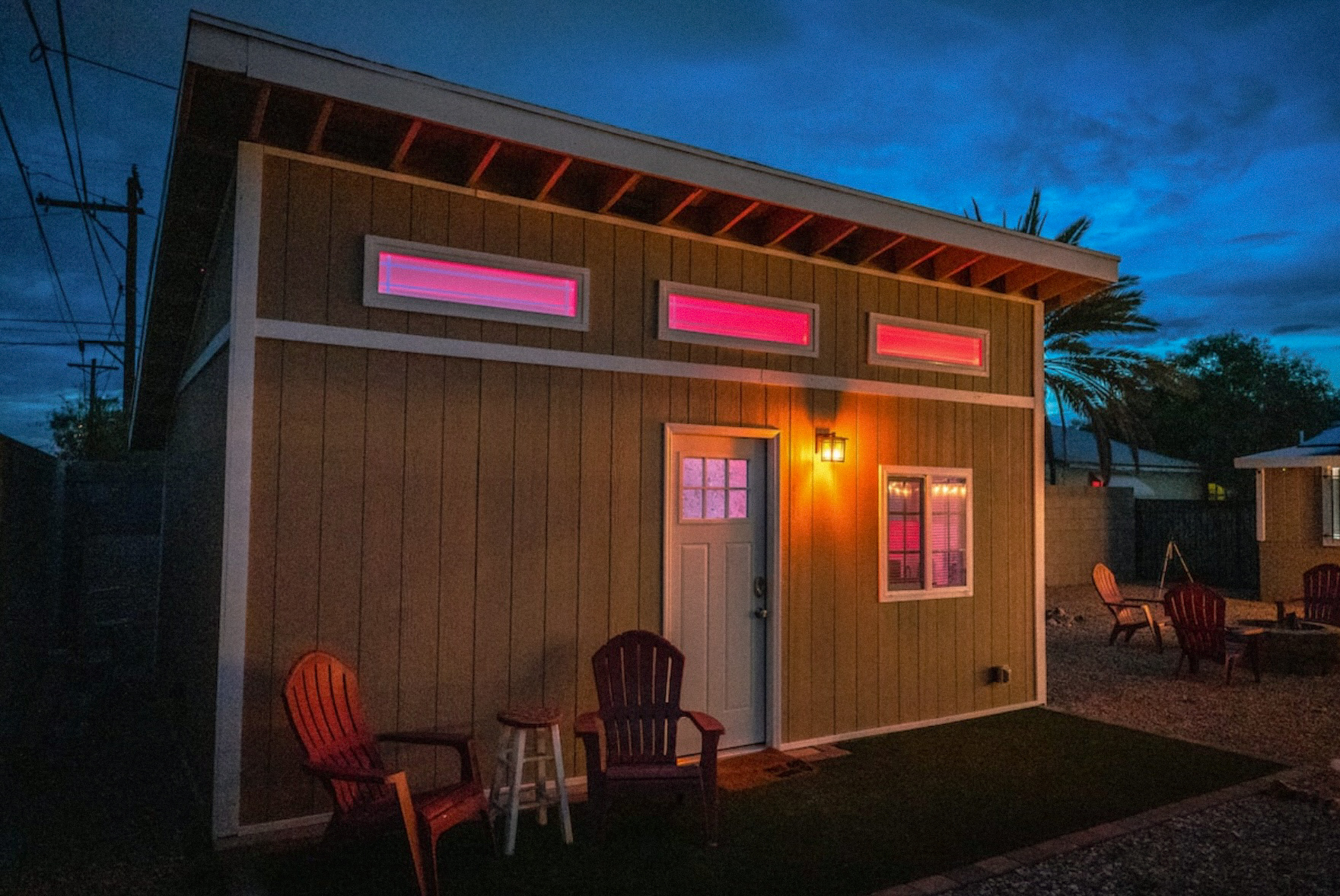 StayReady Tucson Airbnb tiny home rental with outdoor seating and modern LED colorful lighting