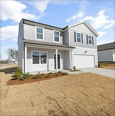Newly built single-family suburban home framed with steel