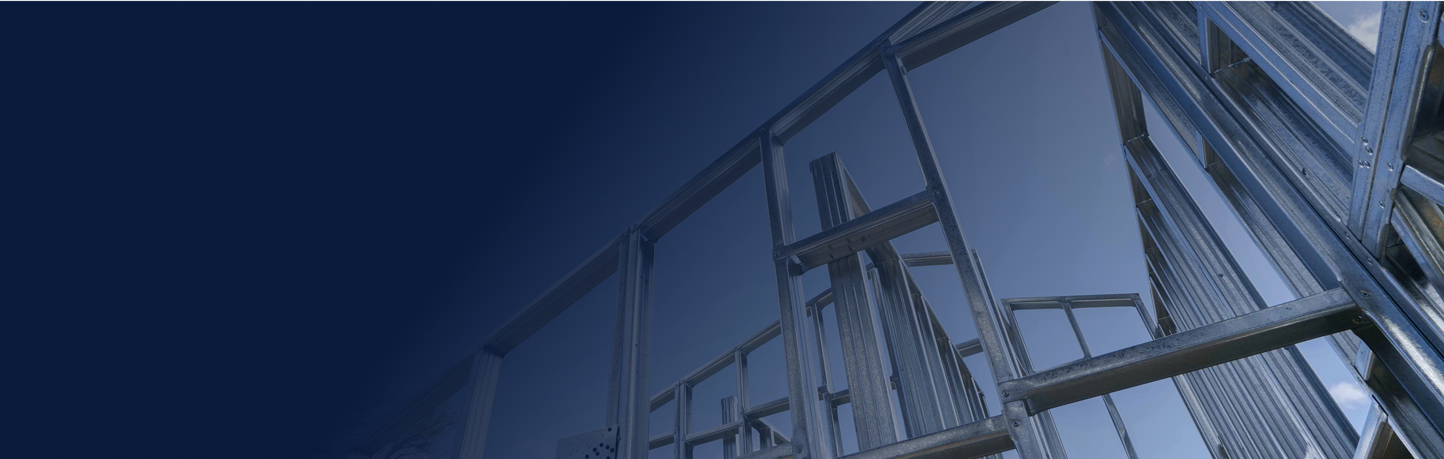 Background image showing steel framing structure from below