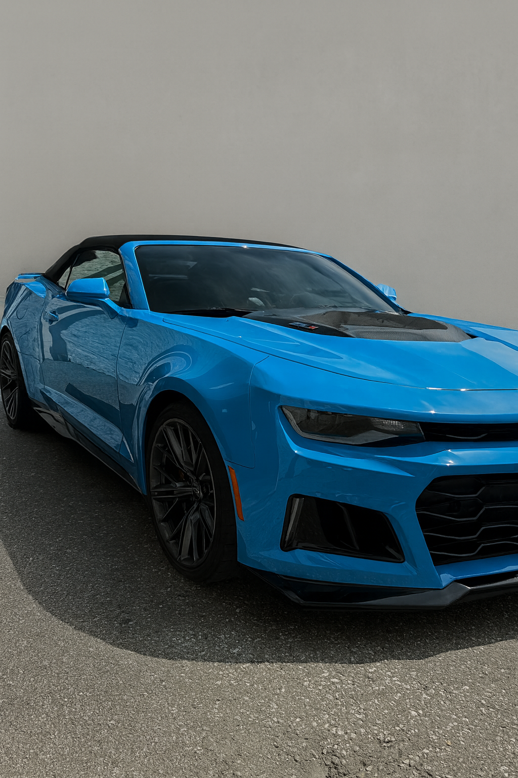 image of a car enthusiast examining a vehicle