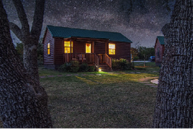 Austin Texas cabin rental with night view and warm lights