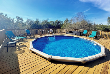 Texas vacation cabin with pool area and outdoor relaxation space